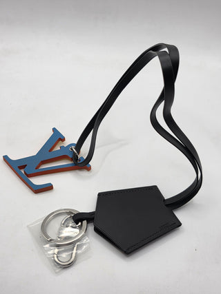 Louis Vuitton Black Leather LV logo bag charm tag