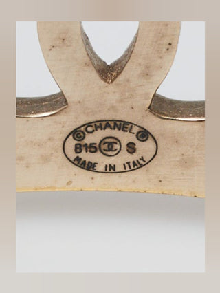 Chanel Goldtone Brushed Metal Logo Cuff Bracelet