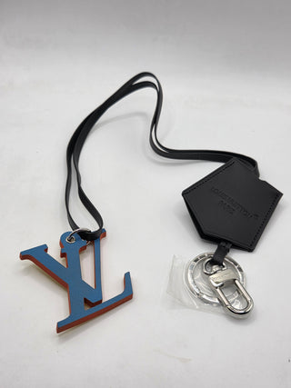 Louis Vuitton Black Leather LV logo bag charm tag