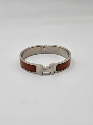 Hermès Orange Enamel Clic H Palladium plated Bangle Bracelet