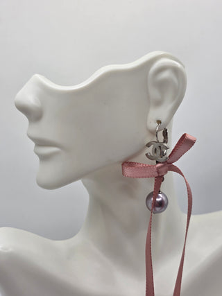 Chanel Silver-tone Faux Pearl Ribbon Bow CC Logo Drop Earrings