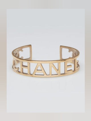 Chanel Goldtone Brushed Metal Logo Cuff Bracelet