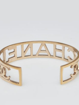 Chanel Goldtone Brushed Metal Logo Cuff Bracelet