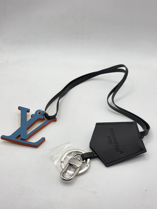 Louis Vuitton Black Leather LV logo bag charm tag