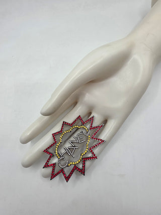 Chanel Silver-tone Strass Logo Burst Brooch