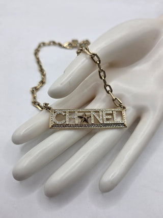 Chanel Gold-tone Strass Logo Pendant Necklace