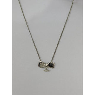 Chanel Silver-tone Interlocking CC Crystal Bow Necklace