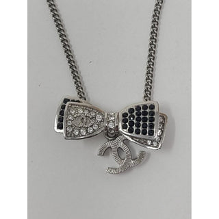 Chanel Silver-tone Interlocking CC Crystal Bow Necklace