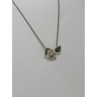 Chanel Silver-tone Interlocking CC Crystal Bow Necklace