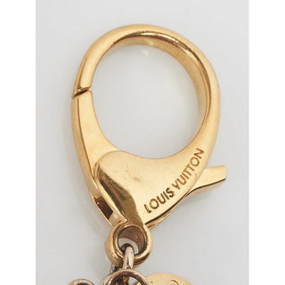 Louis Vuitton multicolor goldtone LV logo bag charm