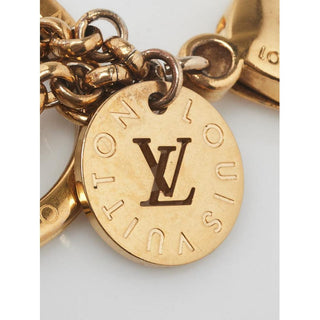 Louis Vuitton multicolor goldtone LV logo bag charm