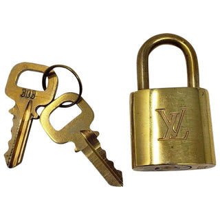 Louis Vuitton goldtone lock and keys set #303