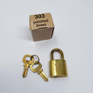 Louis Vuitton goldtone lock and keys set #303