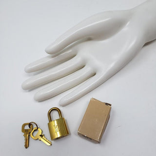 Louis Vuitton goldtone lock and keys set #303