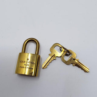 Louis Vuitton goldtone lock and keys set #303