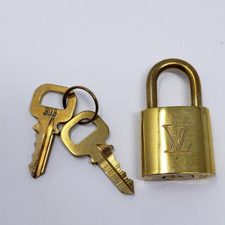 Louis Vuitton goldtone lock and keys set #303