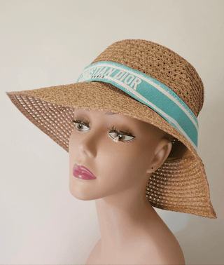 Christian Dior straw hat with embroidered logo trim. size 59.