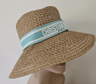 Christian Dior straw hat with embroidered logo trim. size 59.