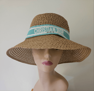 Christian Dior straw hat with embroidered logo trim. size 59.