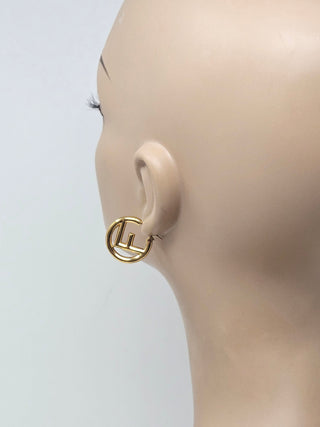 Fendi gold tone F is Fendi Hoop Earrings