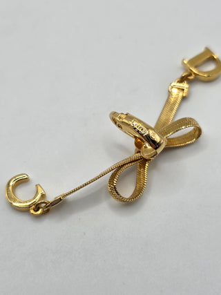 Christian Dior Gold-tone CD Logo Bow Clip-On Earrings