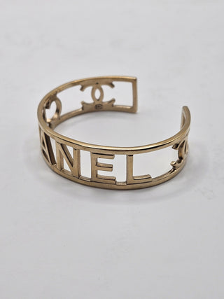 Chanel Gold-tone Logo Cuff Bracelet