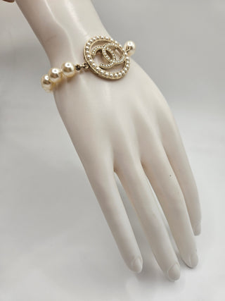 Chanel Gold-tone Faux Pearl Interlocking CC Charm Bracelet