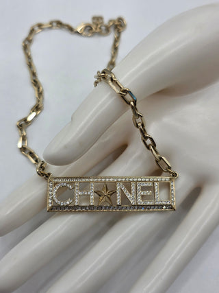 Chanel Gold-tone Strass Logo Pendant Necklace