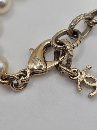 Chanel Gold-tone Faux Pearl Interlocking CC Charm Bracelet