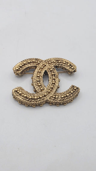 Chanel Gold-tone Resin Textured Interlocking CC Logo Brooch