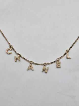 Chanel Gold-tone C-H-A-N-E-L logo charm Collar Necklace