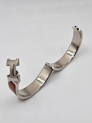 Hermès Orange Enamel Clic H Palladium plated Bangle Bracelet