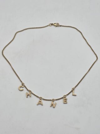 Chanel Gold-tone C-H-A-N-E-L logo charm Collar Necklace