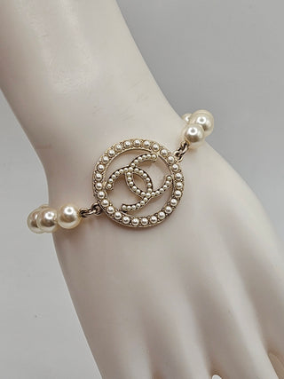 Chanel Gold-tone Faux Pearl Interlocking CC Charm Bracelet