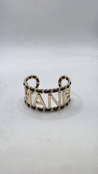 Chanel Gold-tone Leather 'CHANEL' Cuff Bracelet