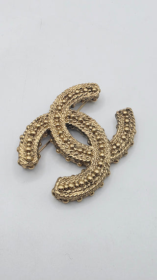 Chanel Gold-tone Resin Textured Interlocking CC Logo Brooch