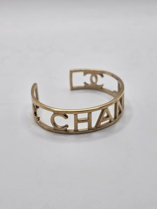 Chanel Gold-tone Logo Cuff Bracelet