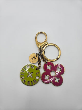 Louis Vuitton multicolor goldtone LV logo bag charm