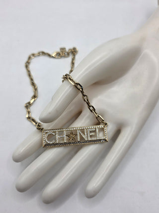 Chanel Gold-tone Strass Logo Pendant Necklace