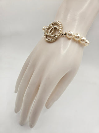 Chanel Gold-tone Faux Pearl Interlocking CC Charm Bracelet