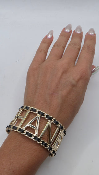 Chanel Gold-tone Leather 'CHANEL' Cuff Bracelet
