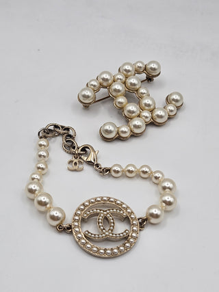 Chanel Gold-tone Faux Pearl Interlocking CC Charm Bracelet