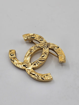 Chanel Gold-tone Textured Interlocking CC Brooch