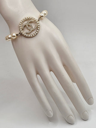 Chanel Gold-tone Faux Pearl Interlocking CC Charm Bracelet