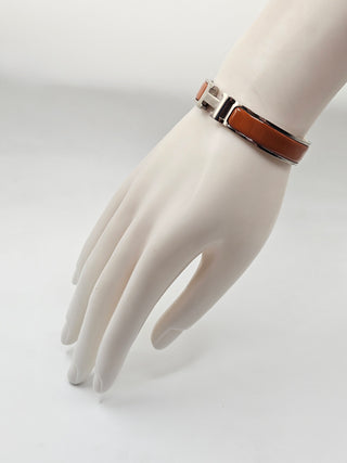 Hermès Orange Enamel Clic H Palladium plated Bangle Bracelet