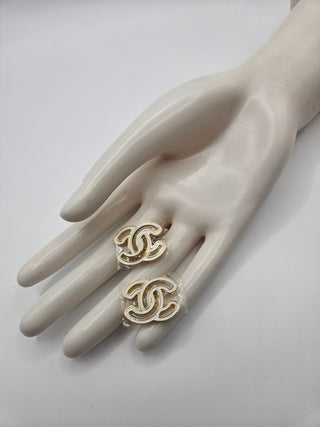 Chanel 2024 Gold-tone white Enamel Interlocking CC logo stud earrings